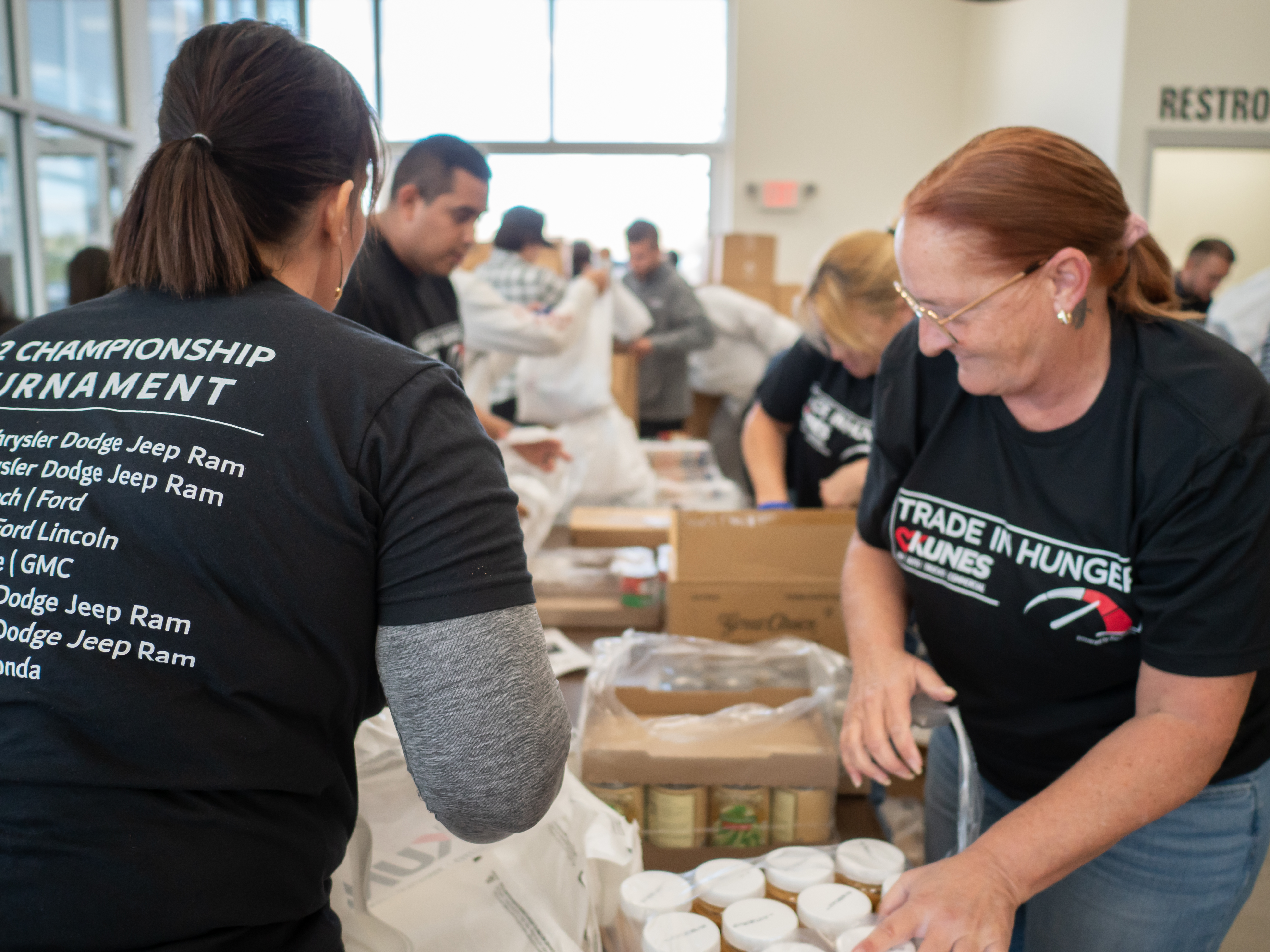 Volunteers Packaging Food