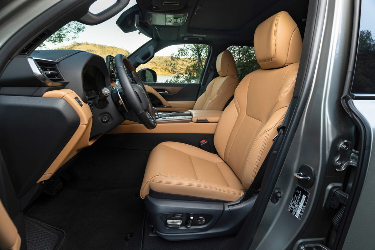 2026 Lexus LX front seat and cockpit with the driver's door open