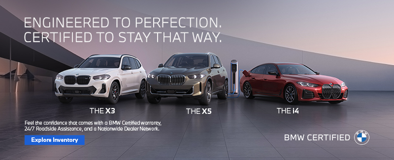 BMW Certified X3, X5, and i4 parked on a modern rooftop at sunrise.