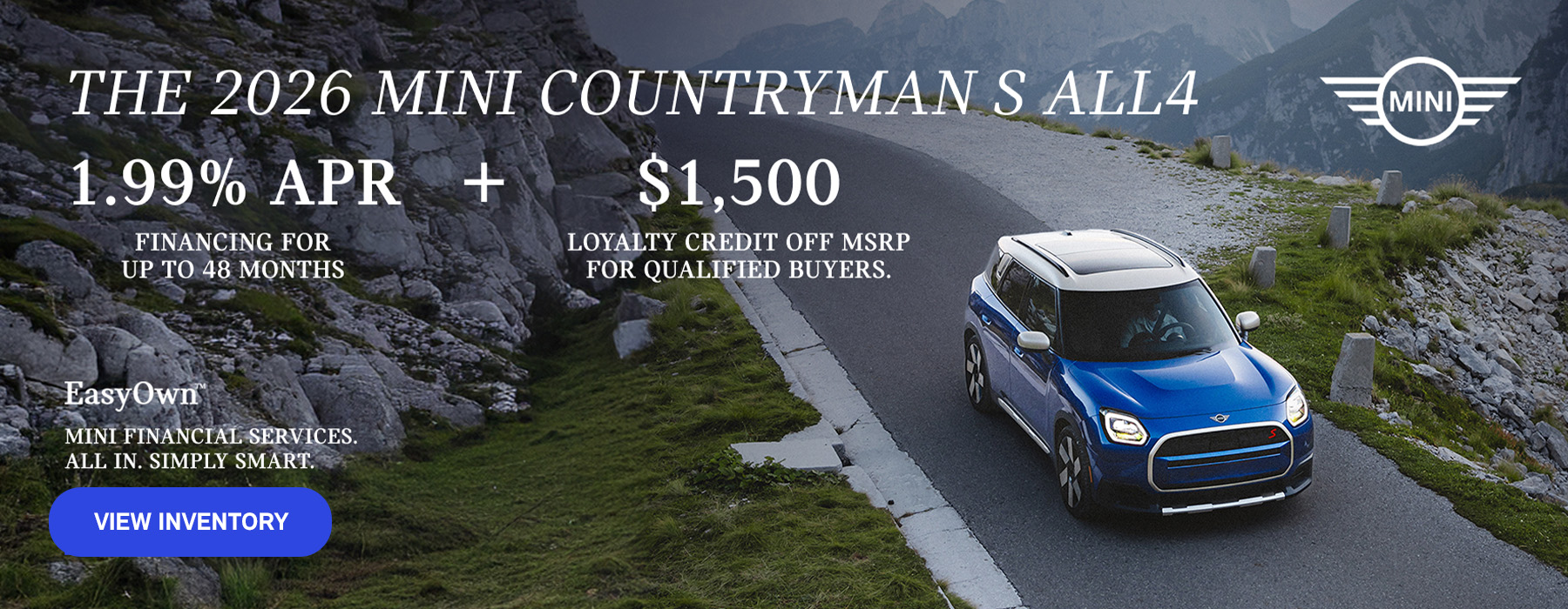 Front passenger side view of a MINI Countryman  driving on a mountainous road.