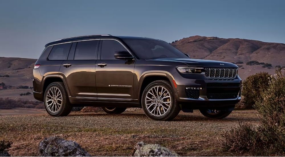 Brown 2023 Jeep Grand Cherokee parked off-road
