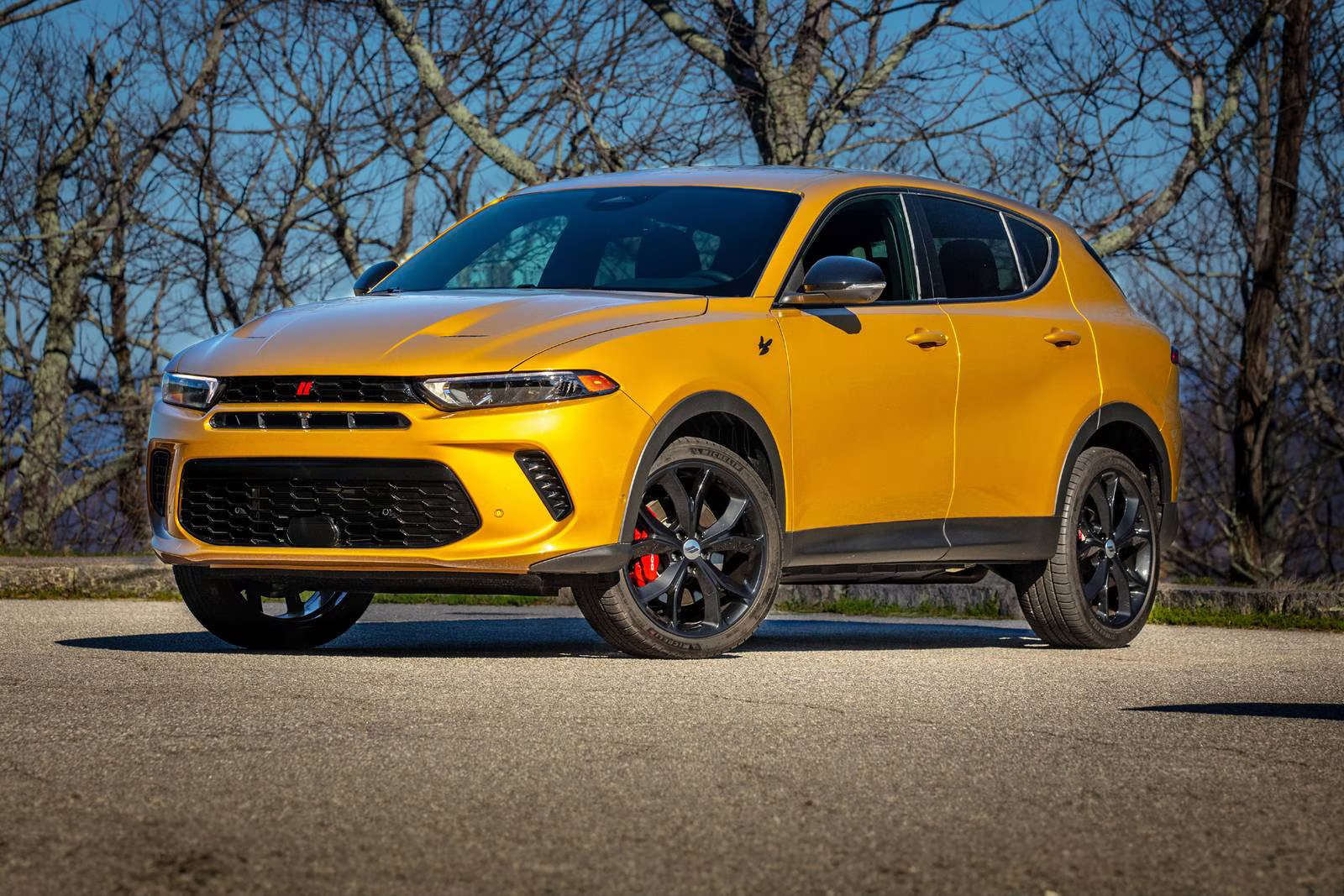 A yellow car sitting parked.
