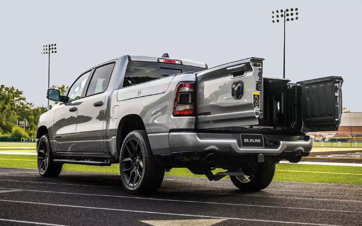 2025 RAM 1500 Exterior Driver Side Rear Profile with Multi-Function Tailgate Split Fully Open