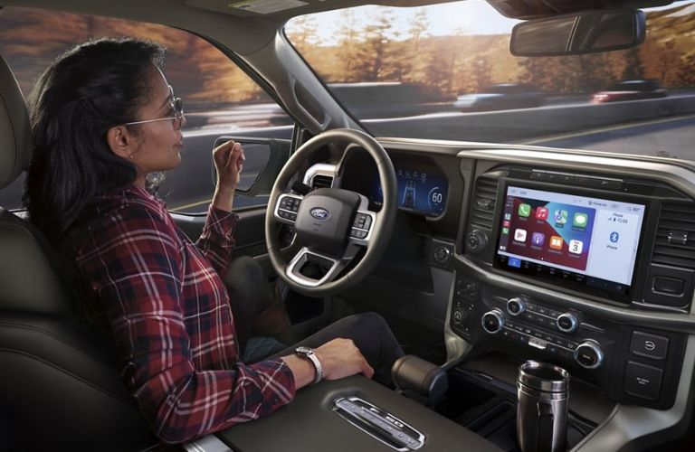 Woman Using Ford SuperCruise Hands-Free in 2024 Ford F-150