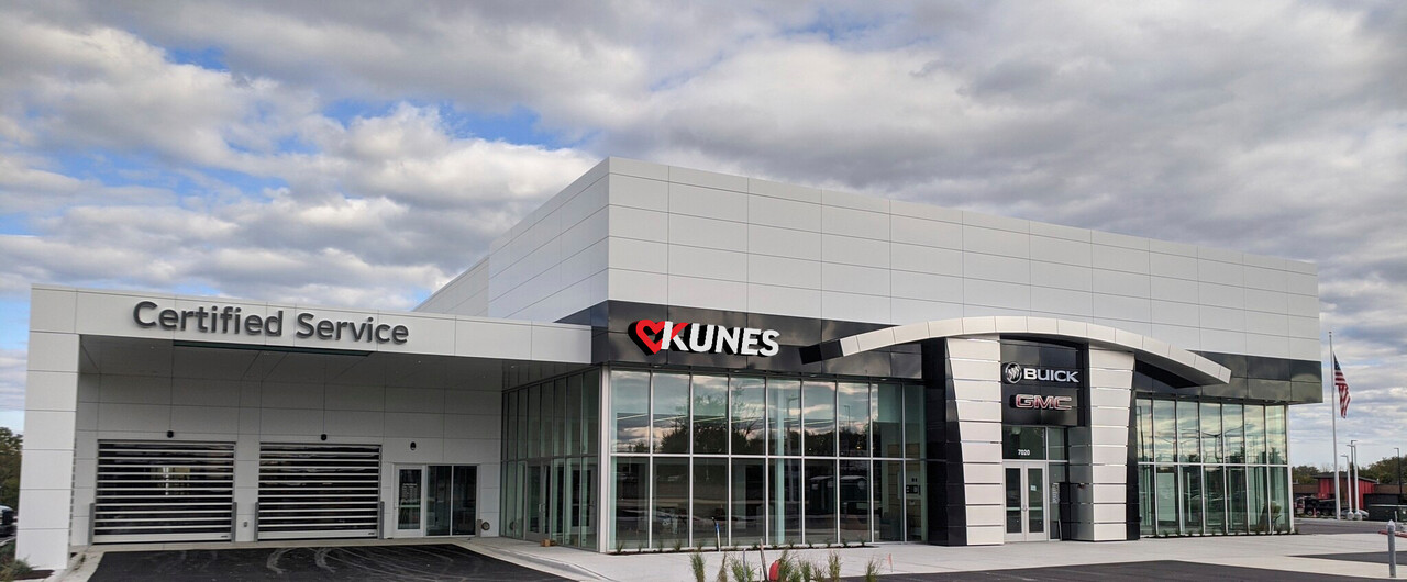 Render of the Kunes logo (red heart intersecting the K) on the Oak Creek Buick GMC dealership, in Oak Creek, Wisconsin