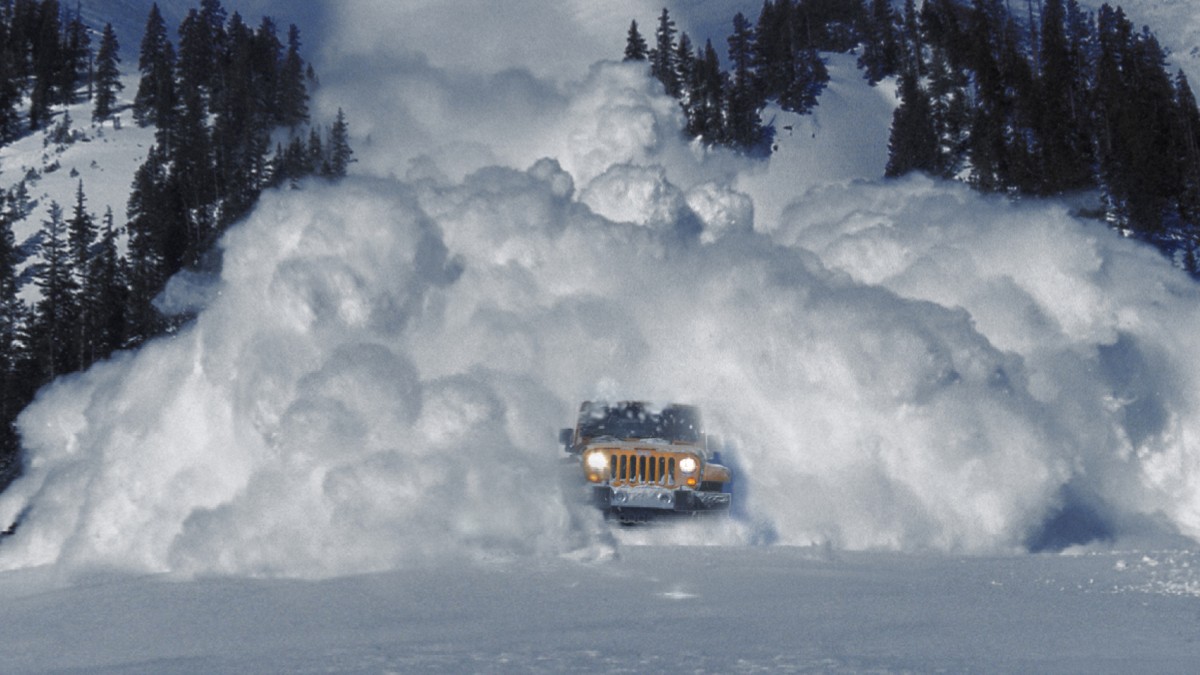 2012 Jeep Wrangler Exterior Front Fascia Driving from Snowy Avalanche