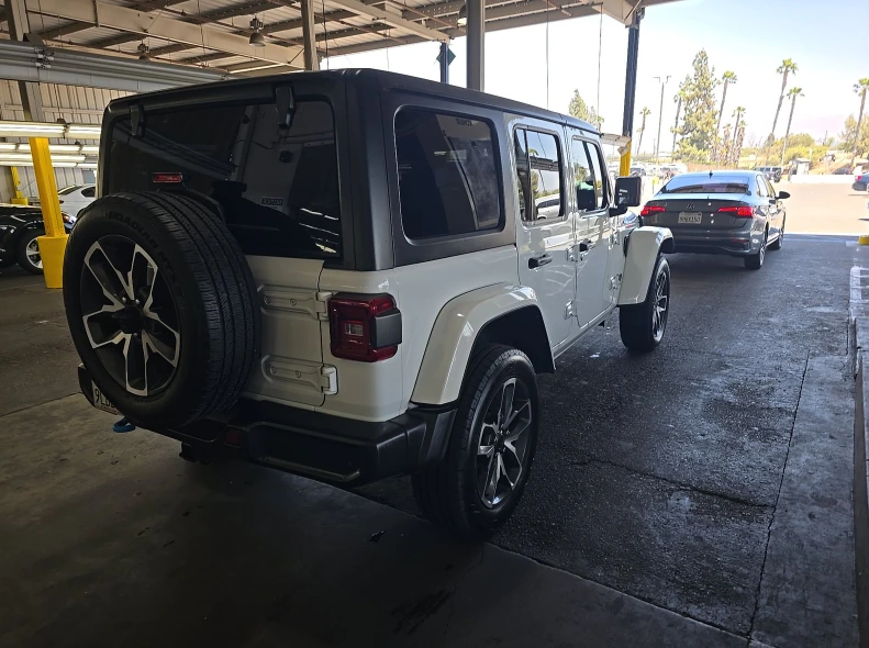 Used 2024 Jeep Wrangler 4xe Sports S 4XE with VIN 1C4RJXN6XRW146068 for sale in Kansas City