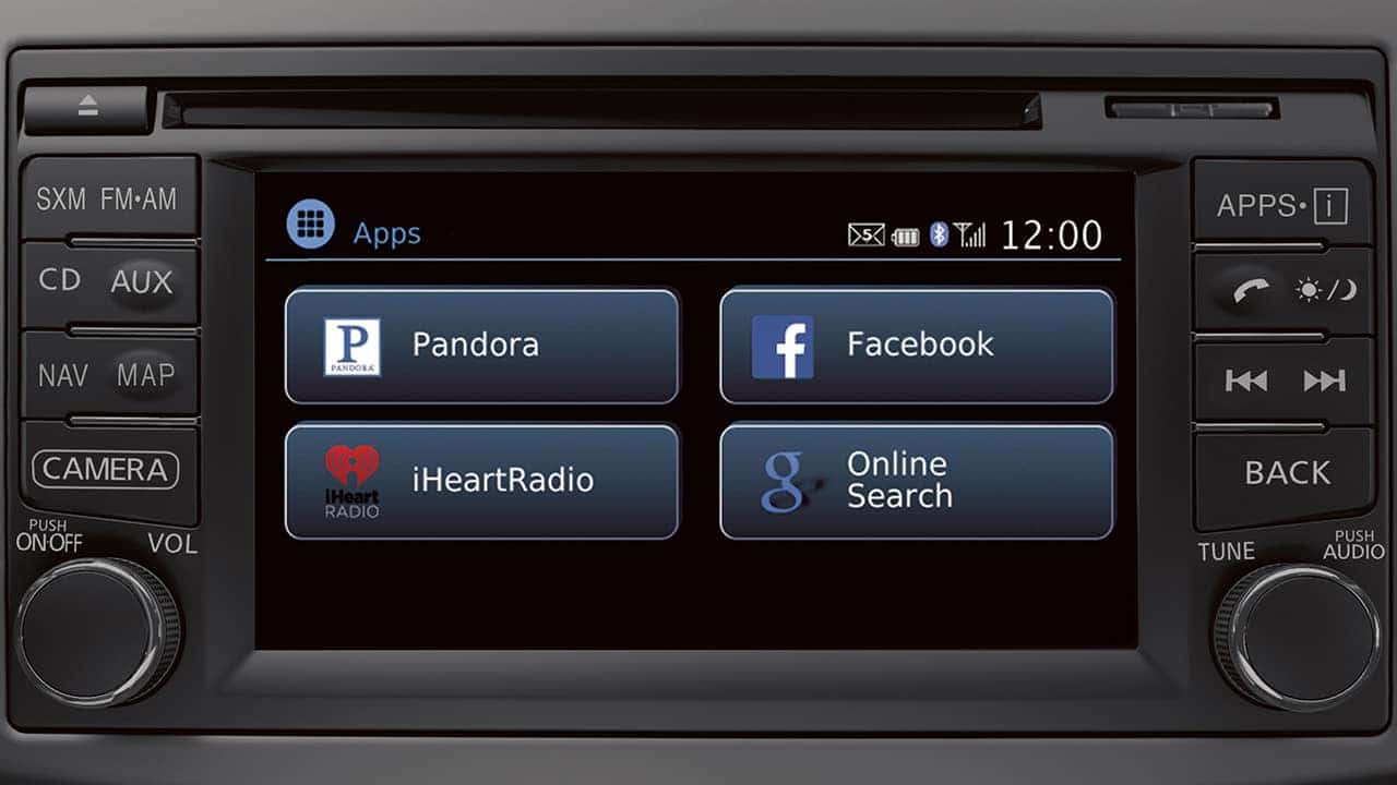 2017 Nissan Versa audio display showing Pandora, Facebook and iHeartRadio apps