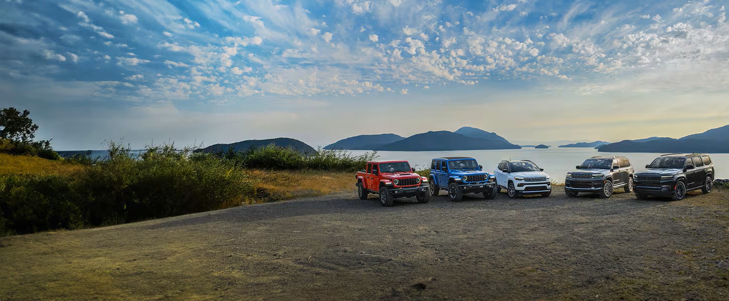 an image of 2024 jeep lineup overlooking the ocean with islands