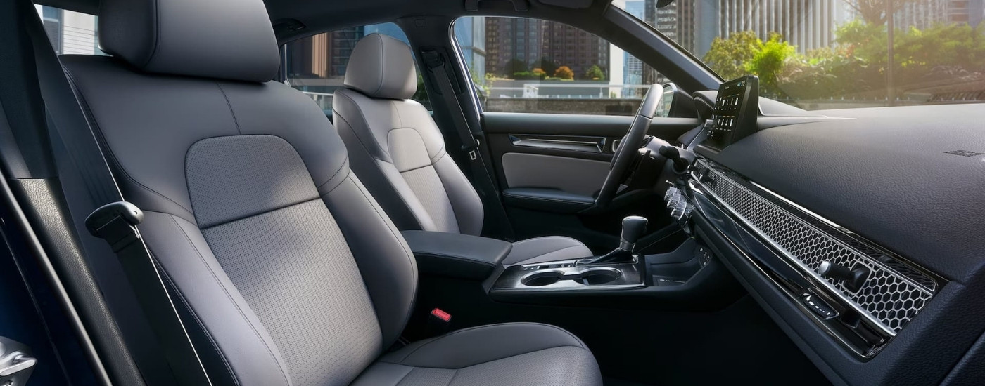 gray interior and dash is shown in a 2025 Honda Civic