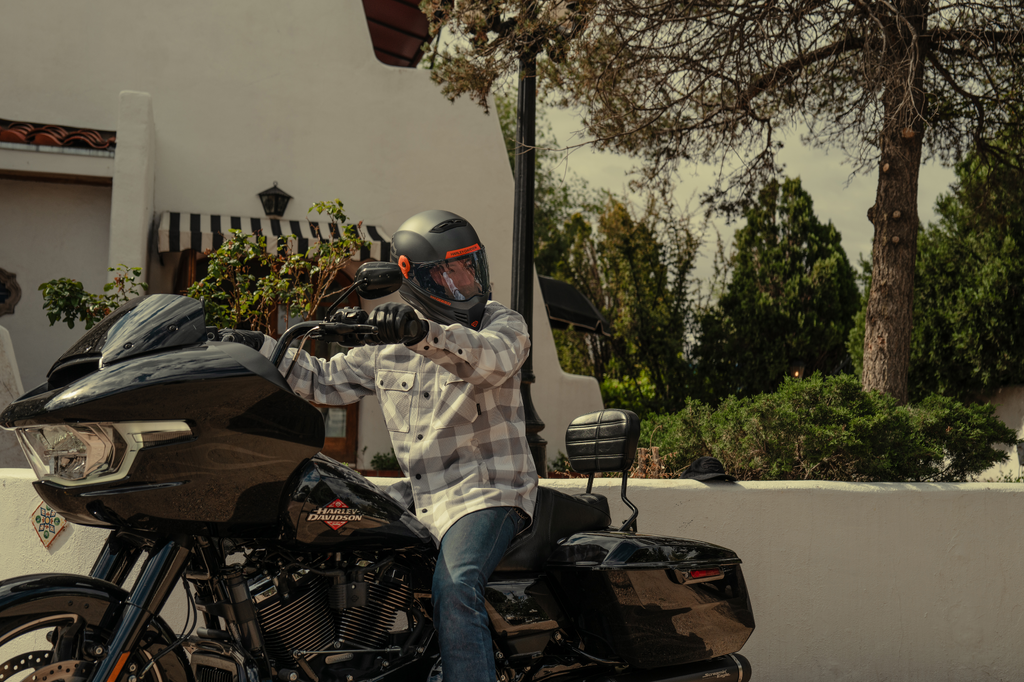 Man riding a 2026 Harley-Davidson Road Glide wearing summer riding gear by Harley-Davidson