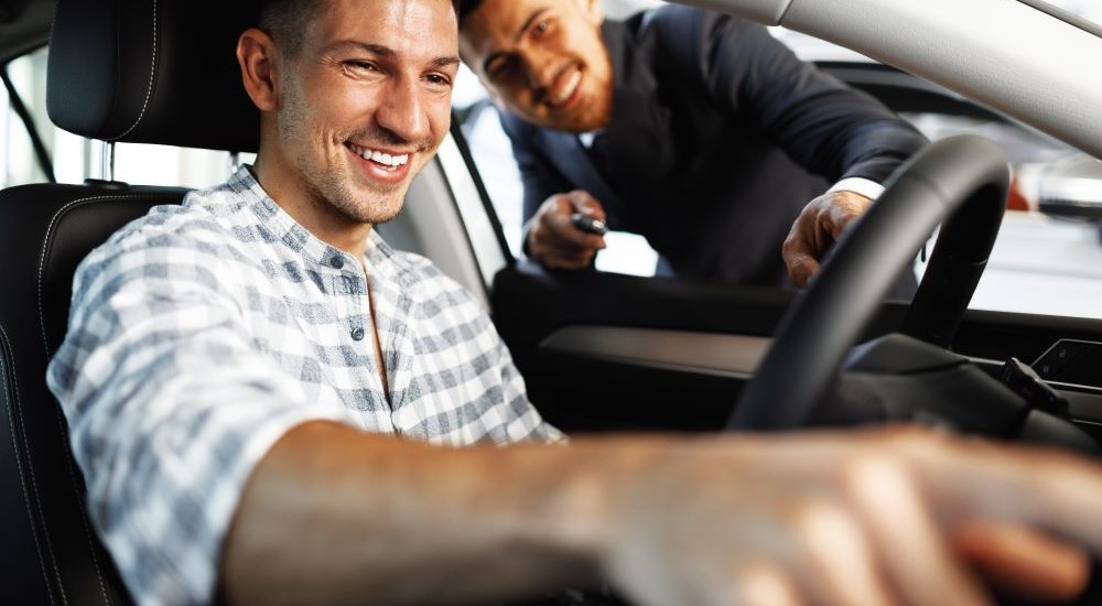 Smiling customer in a vehicle