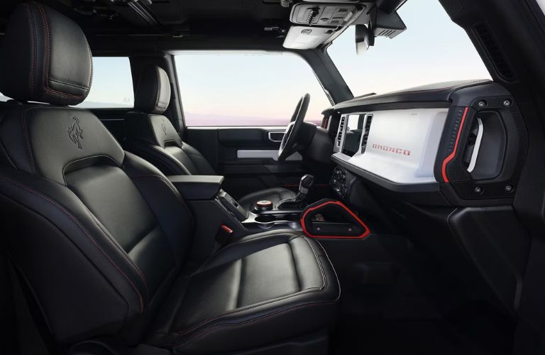 Black 2025 Ford Bronco Stroppe Edition Interior with White Dashboard and Red Accents