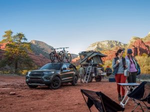 people at a campsite with a 2021 Ford Explorer Timberline