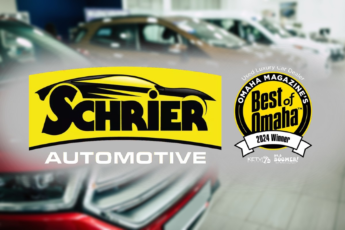 Schrier Automotive Logo in front of Used Cars