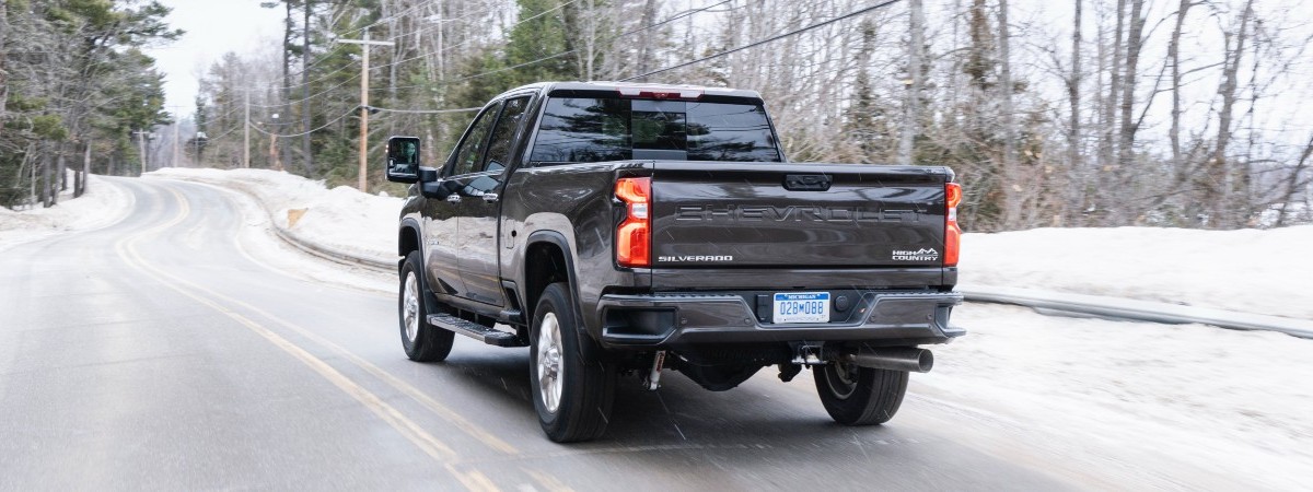 2020 Chevrolet Silverado 2500HD Exterior Driver Side Rear Angle in Snow