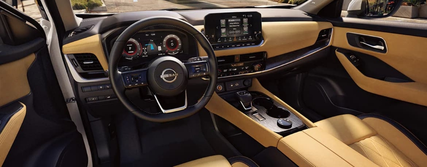 Tan leather interior of a 2023 Nissan Rogue for sale