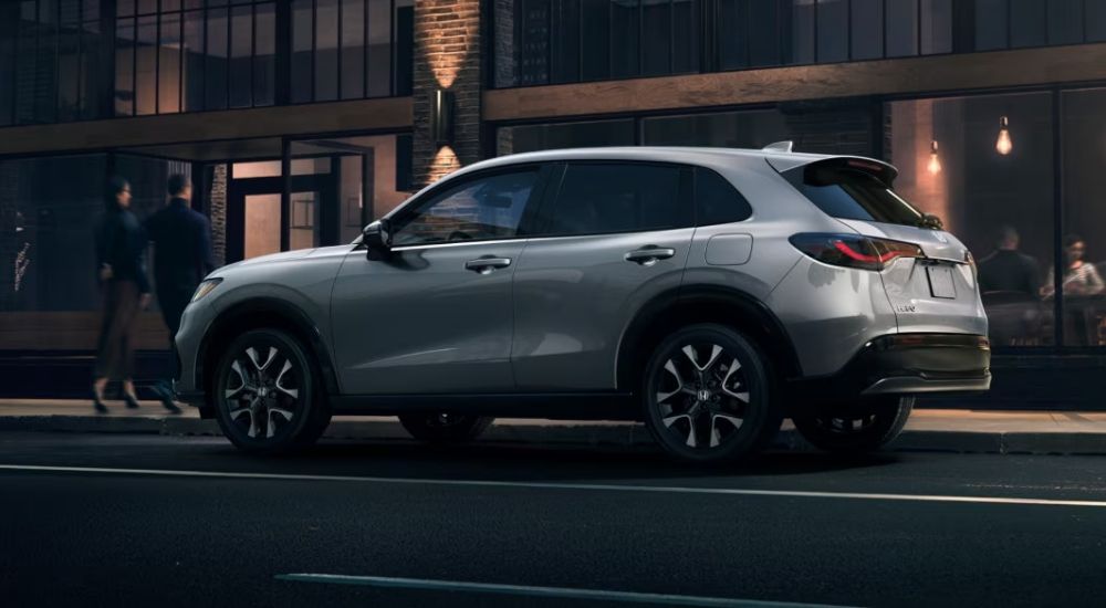 Grey 2026 Honda HR-V EX-L parked near a restaurant