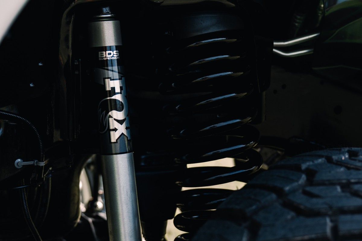 Custom Vossen 8 Lug Pearl RAM 3500 Exterior Suspension Lift Kit Close Up