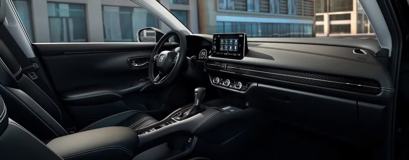 The black interior and dash in a 2025 Honda HR-V.
