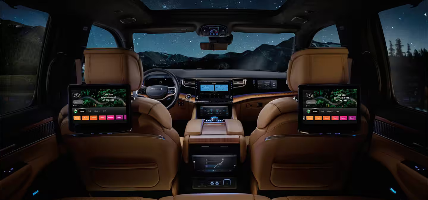 The front and rear entertainment screens in the jeep grand wagoneer.