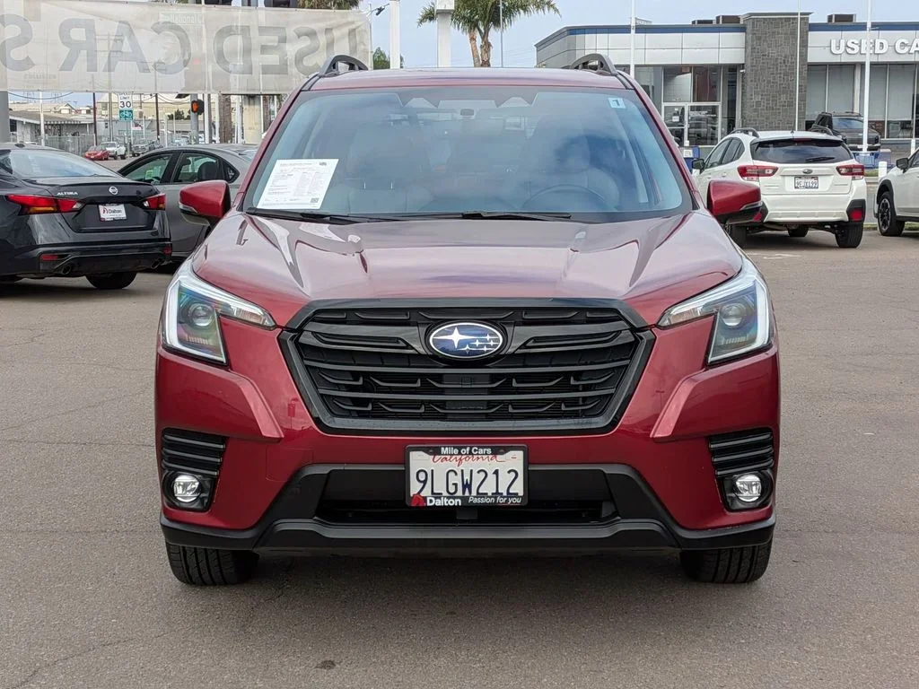 Front of a red used 2024 Subaru Forester Limited on the Dalton Subaru National City used-car lot