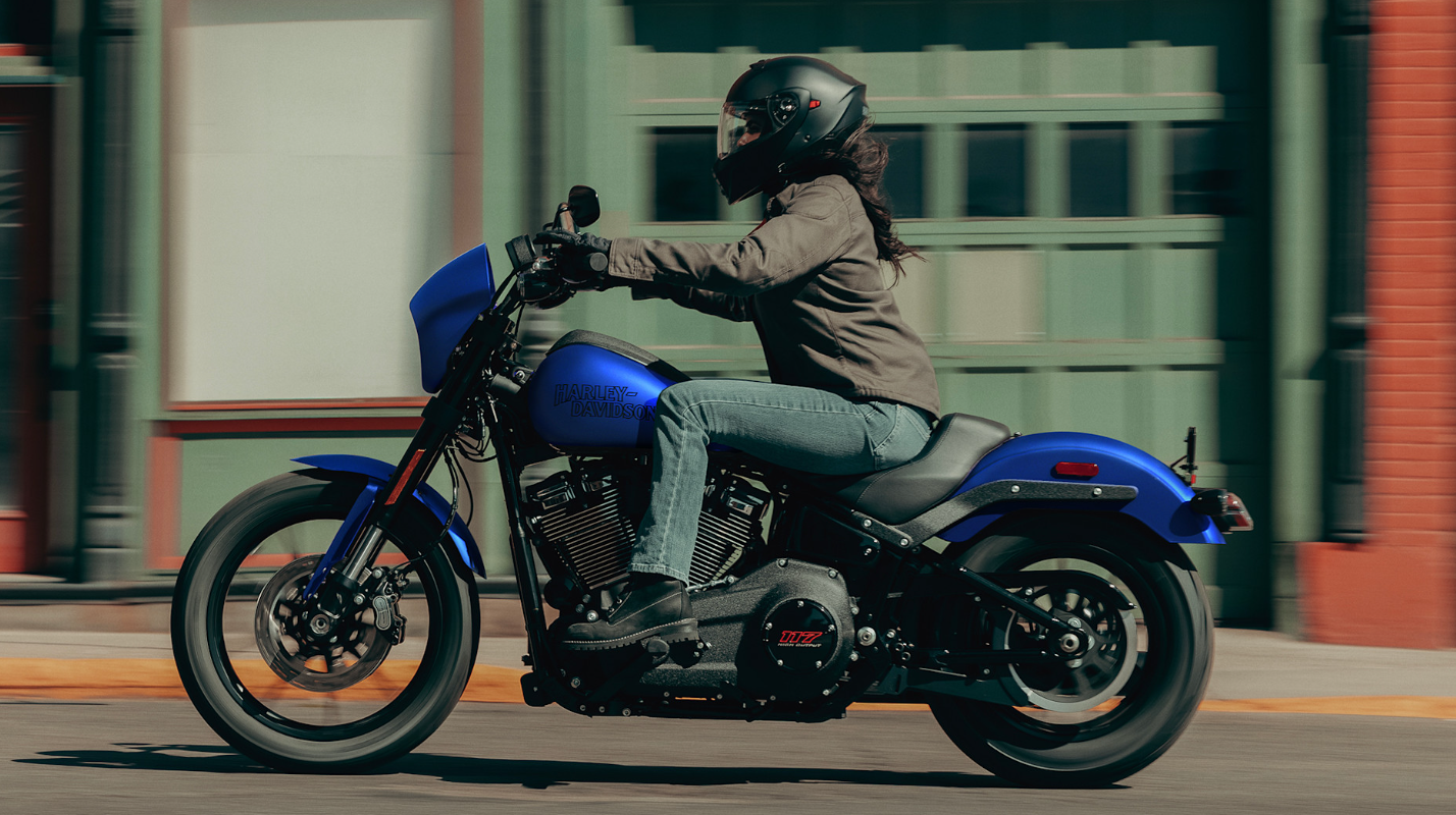 2026 Harley-Davidson® Low Rider® S in blue cruising through city streets