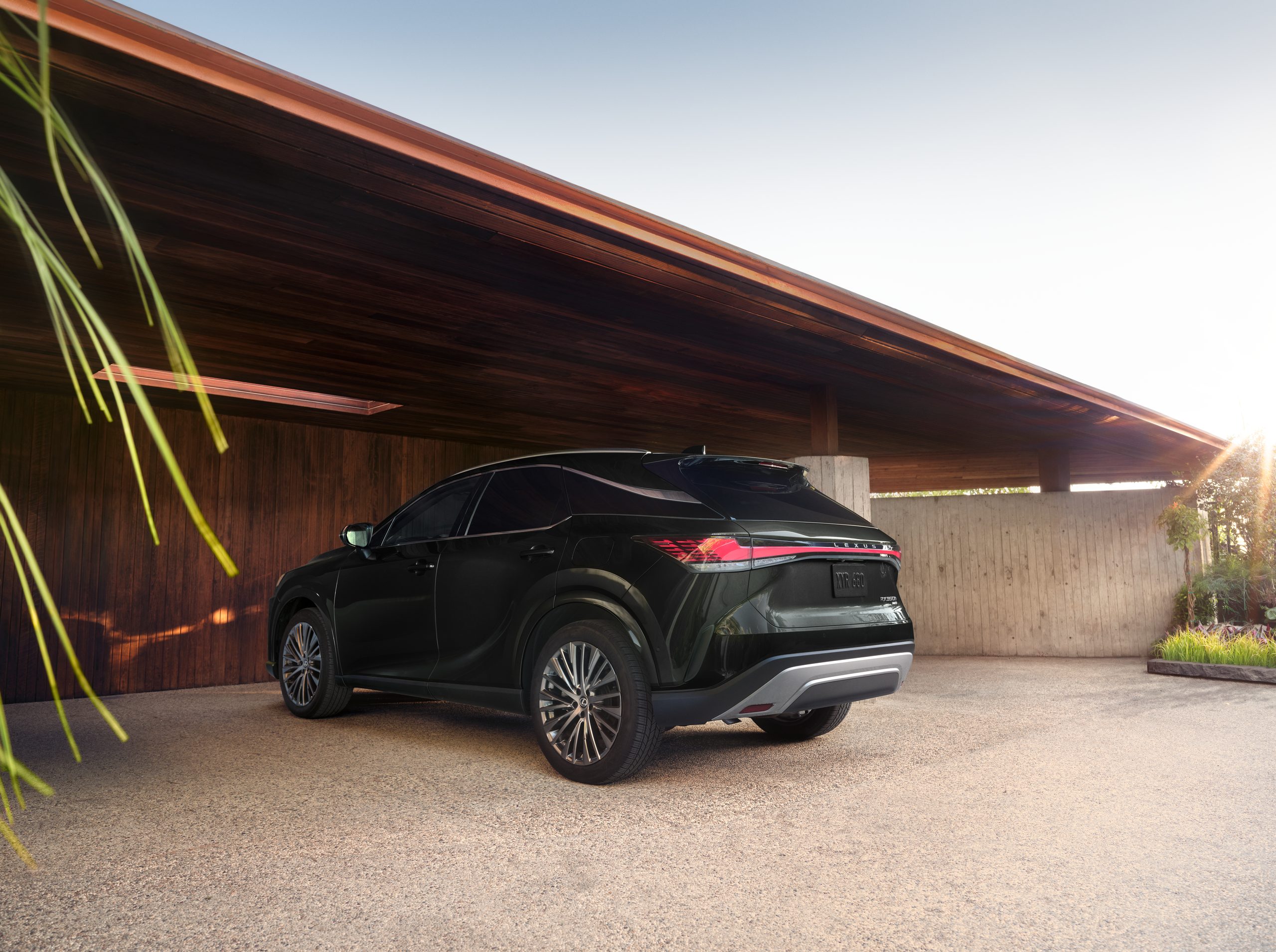RX350 Hybrid Luxury all-wheel drive shown in Caviar exterior color. 