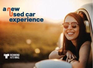 Image of a woman smiling, with text overlay "a new used car experience"