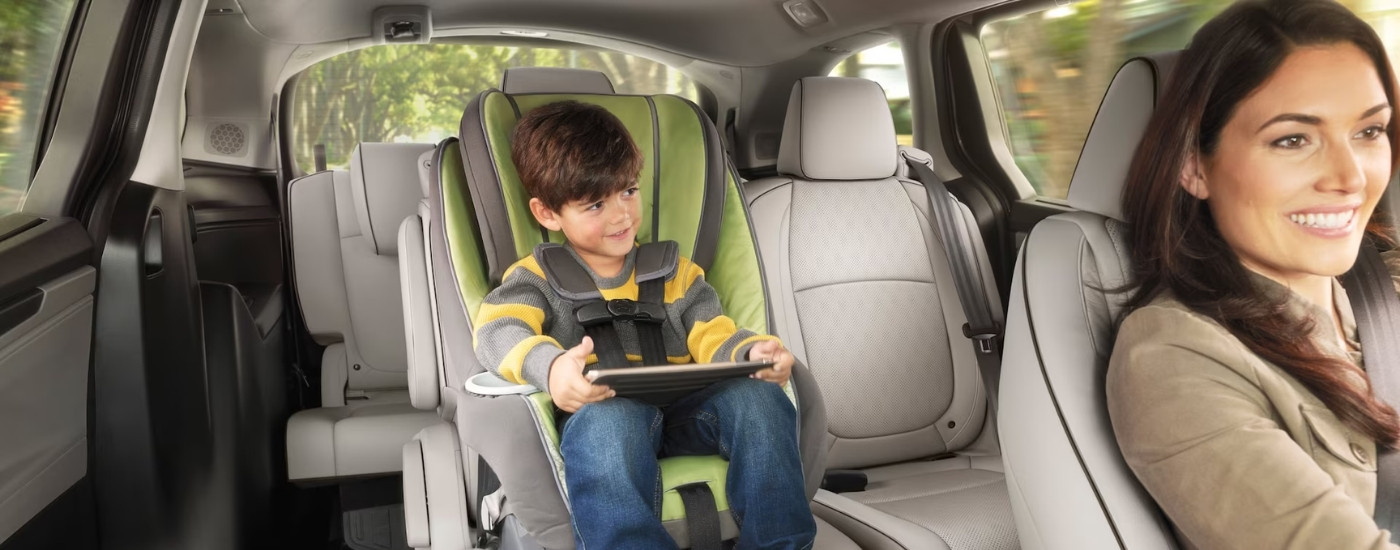 Child in a carseat in a 2026 Honda Odyssey Elite