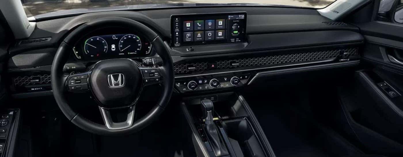 The black interior and dash in a 2024 Honda Accord for sale in Rochester is shown.