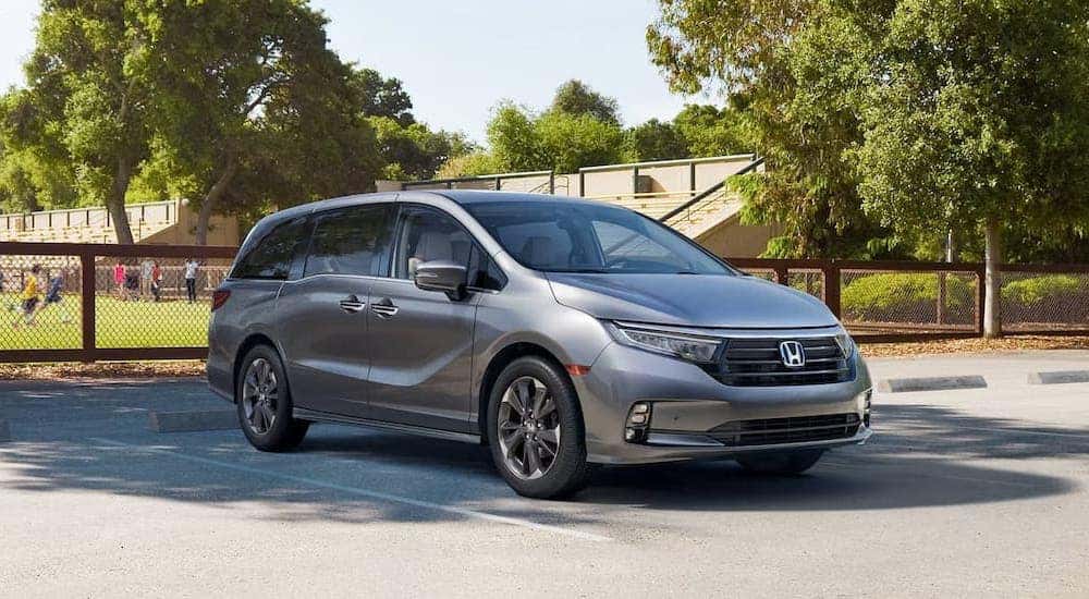 A grey 2025 Honda Odyssey parked and angled right.