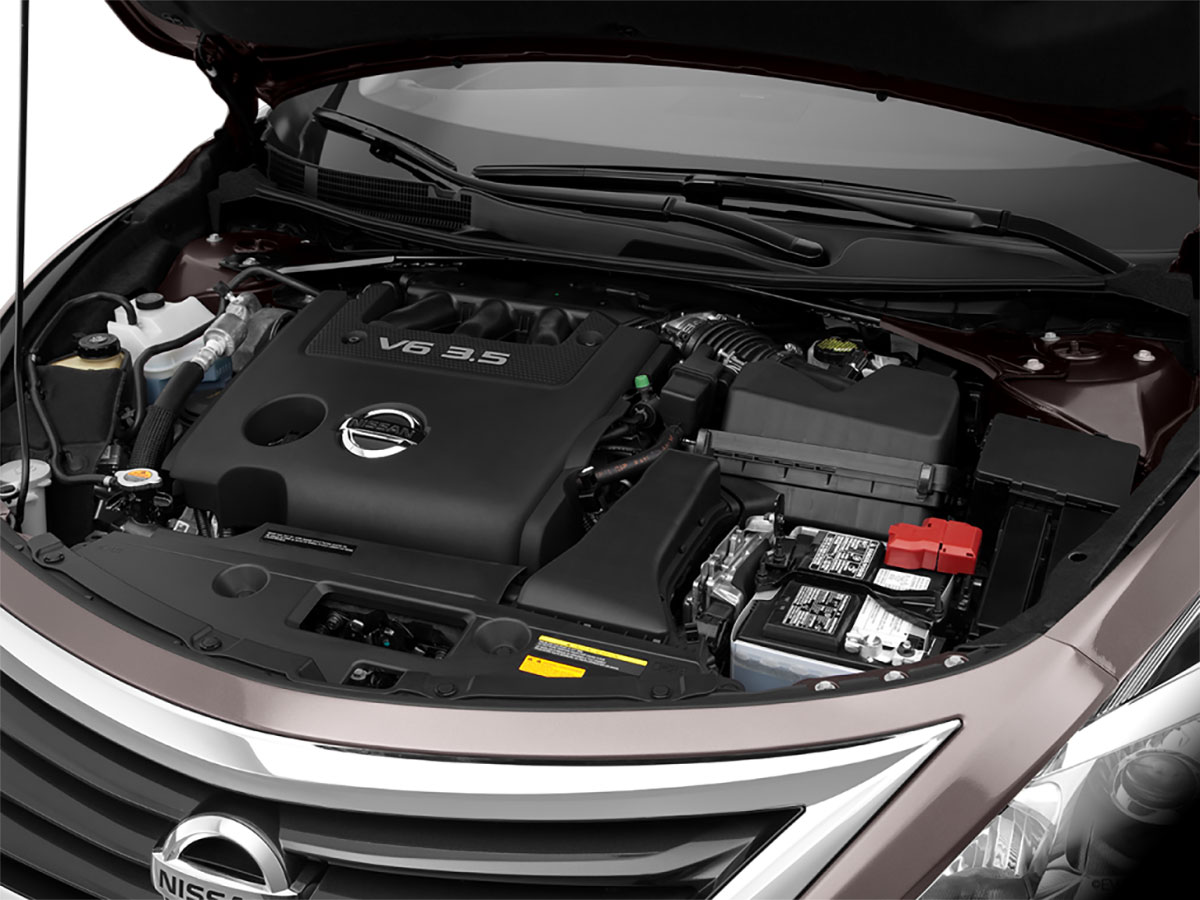 Open hood of a Nissan Altima showing the engine bay