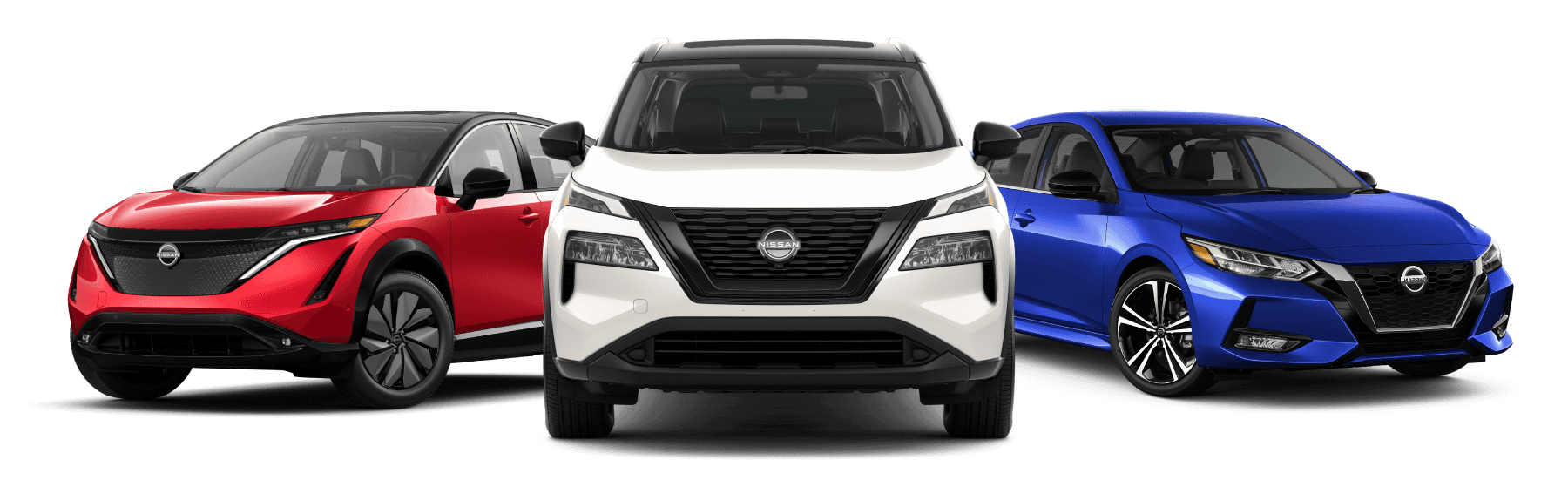 Red Nissan ARIYA, white Nissan Rogue and blue Nissan Sentra parked side by side