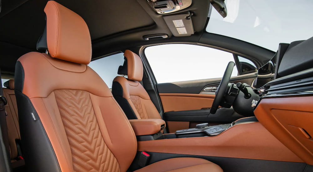 Brown and black interior of a 2026 Kia Sportage