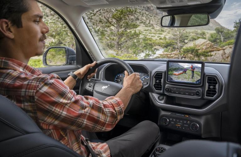 Man Driving 2023 Ford Bronco Sport