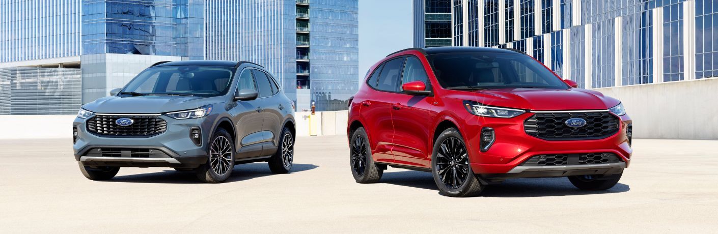 Blue and Red 2023 Ford Escape Models in a Parking Lot