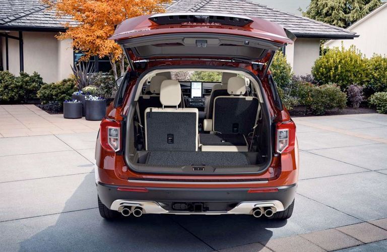 rear view of a red 2021 Ford Explorer ST with cargo door open