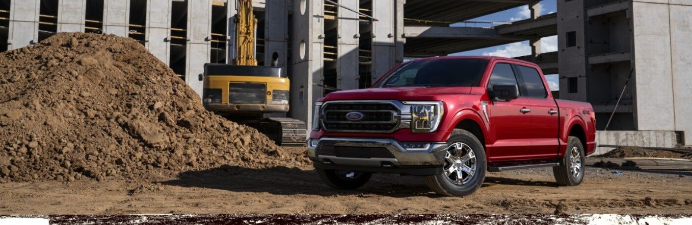 front view of a red 2021 Ford F-150 Hybrid