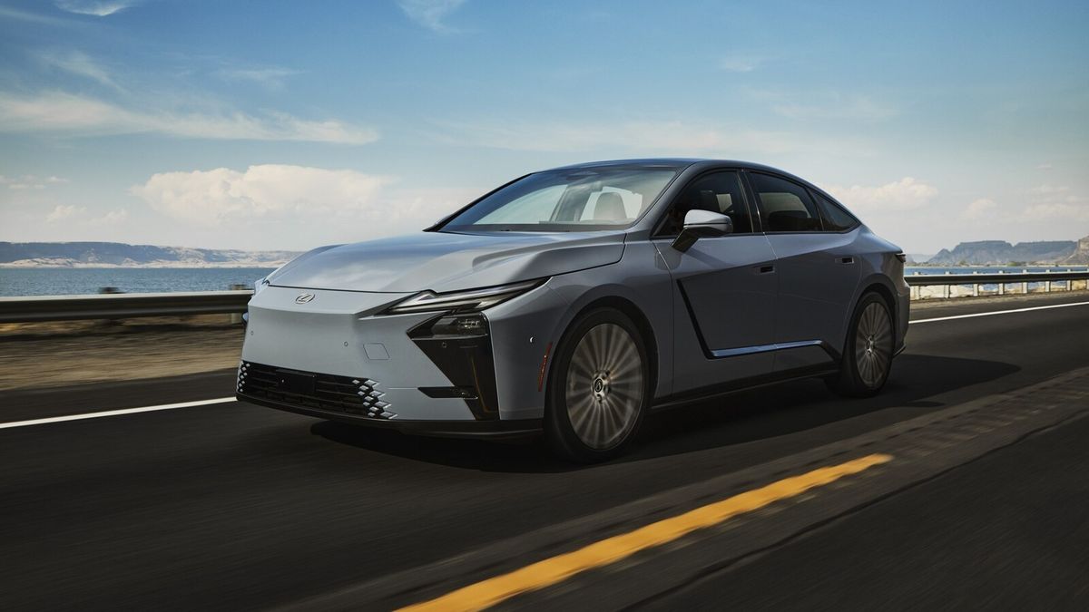2026 Lexus ES driving on coastal highway