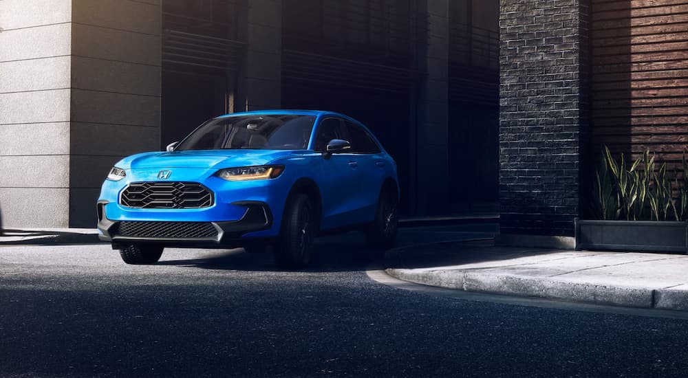 Blue 2026 Honda HR-V leaving a Honda dealer near Clarence