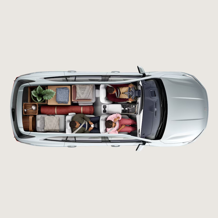 Overhead cutaway view of a Buick Enclave with passengers and cargo inside