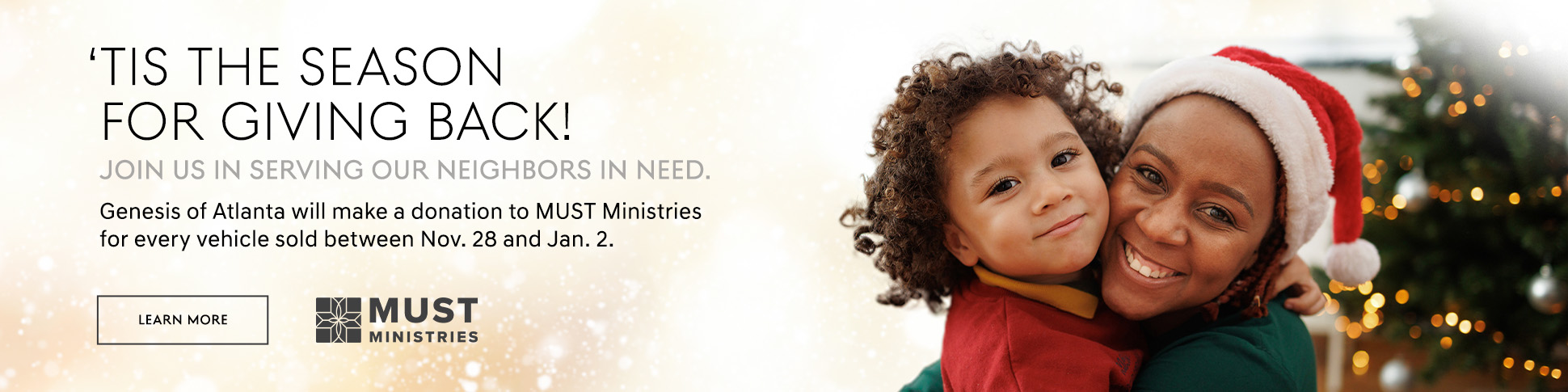 Holiday banner featuring a mother and child smiling in festive clothing. Text on the left reads “’Tis the season for giving back. Join us in serving our neighbors in need. Genesis of Atlanta will make a donation to MUST Ministries for every vehicle sold between Nov. 28 and Jan. 2.” The MUST Ministries logo appears below the text.