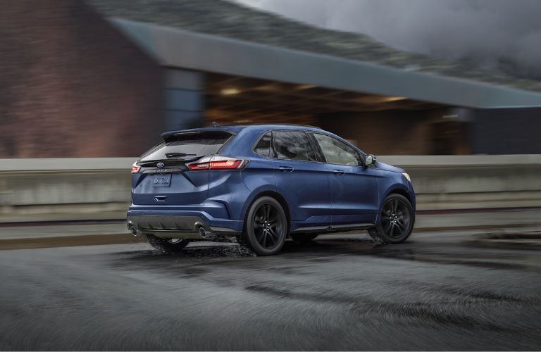 Blue 2023 Ford Edge Rear Exterior on a Freeway