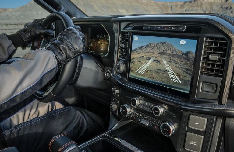 Man Driving 2025 Ford F-150 Raptor with Trail Cam