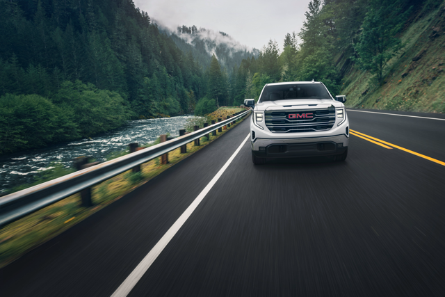 a white GMC truck in the nature