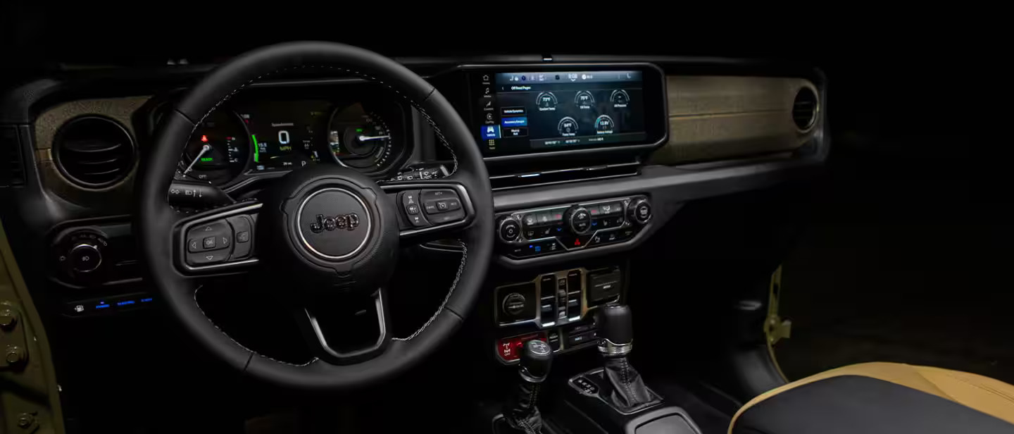 The front dash board in the jeep wrangler.