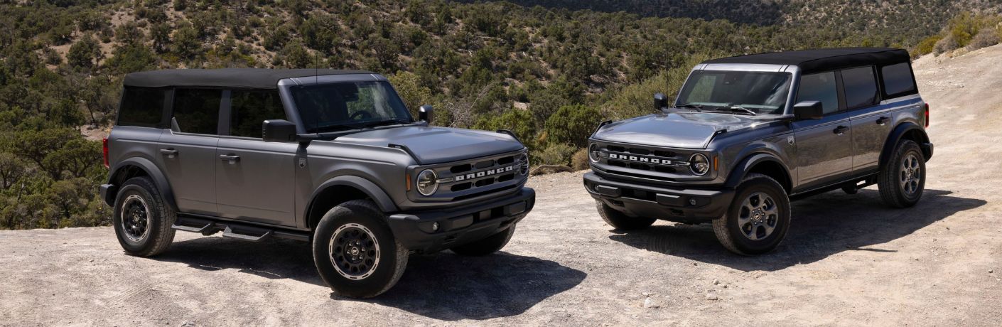 Gray 2025 Ford Bronco with Matte Clear Film and Gray 2025 Ford Bronco on Desert Road