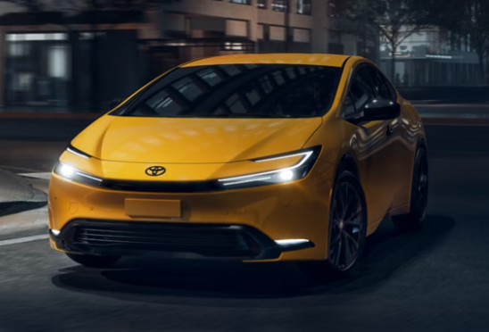 2025 Toyota Prius Hybrid in yellow paint color.