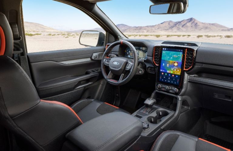 Gray 2024 Ford Ranger Raptor Dashboard, Steering Wheel and Touchscreen with Orange Accents